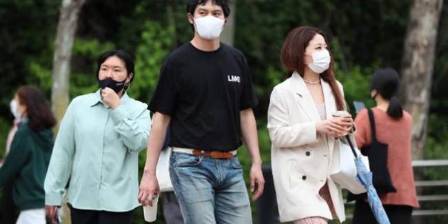 Güney Kore'de maske kullanım şartları esnetilecek