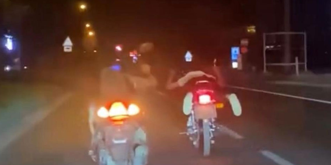 Bolu’da D-100’de motosikletin üstünde yatarak tehlikeli yolculuk yapan magandalar kamerada