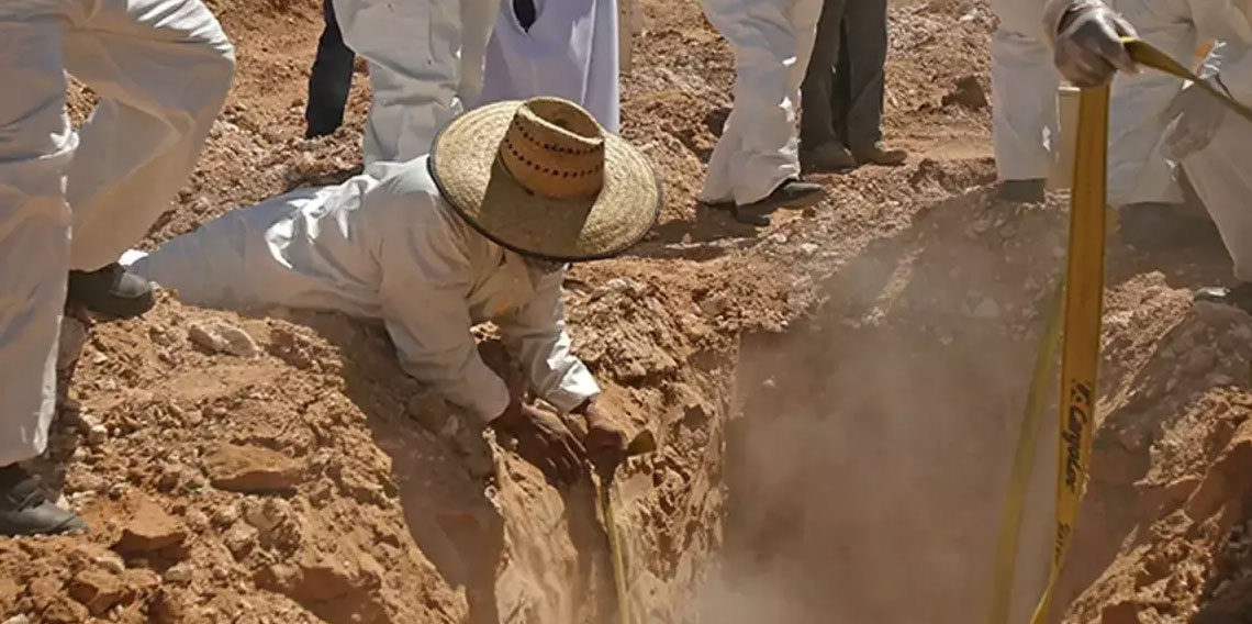 Çete üyesi sanılarak öldürülen madencilerin cesetleri gizli mezarda bulundu